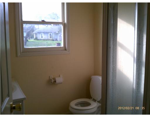 401 Moore Portland, TX 78374 - Photo 5 of 8 a bathroom with a toilet