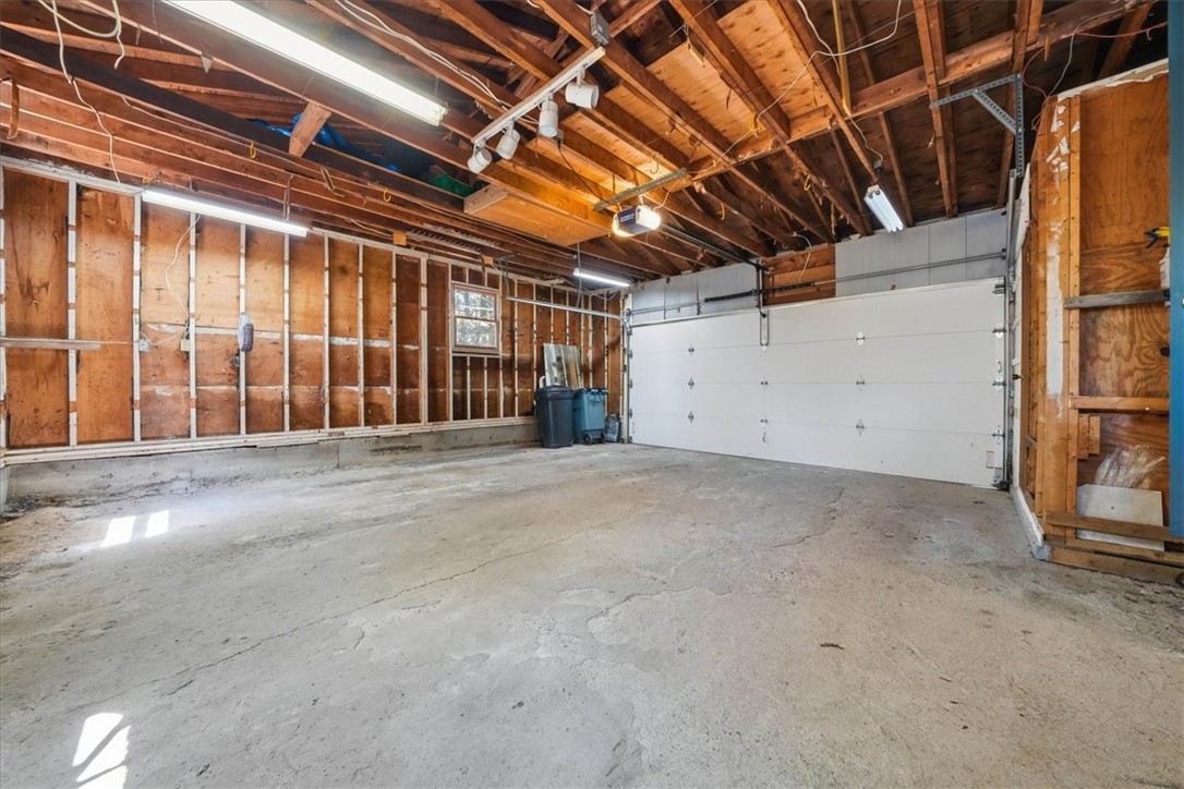 322 Rocky Hill Road Scituate, RI 02857 - Photo 38 of 50 Huge 2-car garage w/ opener, high ceilings, direct entry & large cedar closet—great for storage, workshop or hobby space.