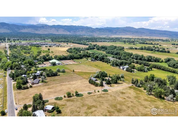 a view of a backyard with mountain view