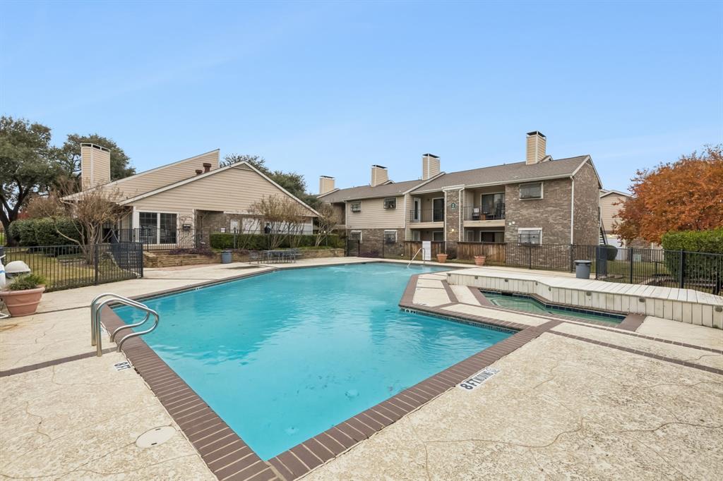 4748 Old Bent Tree Lane, Unit 1808 Dallas, TX 75287 - Photo 27 of 28 a view of a house with swimming pool and sitting area