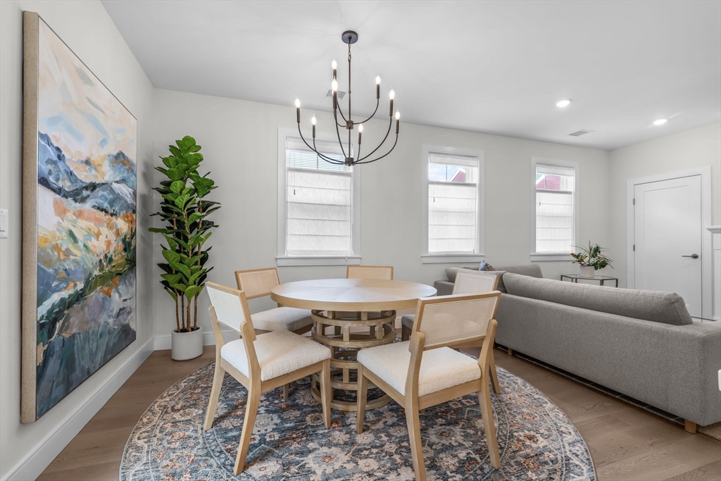28 Oxbow Road, Unit 142 Raynham, MA 02767 - Photo 14 of 42 a view of a dining room with furniture window and outside view