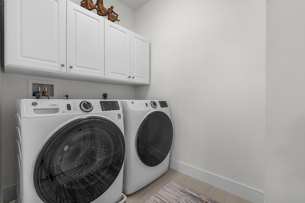 28 Oxbow Road, Unit 142 Raynham, MA 02767 - Photo 26 of 42 a utility room with dryer and washer