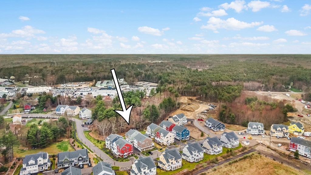 28 Oxbow Road, Unit 142 Raynham, MA 02767 - Photo 40 of 42 a view of a lake with a city