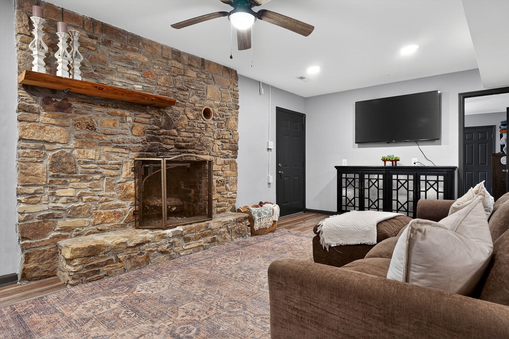 9388 Harrison Ferry Road McMinnville, TN 37110 - Photo 21 of 41 a living room with furniture and a flat screen tv