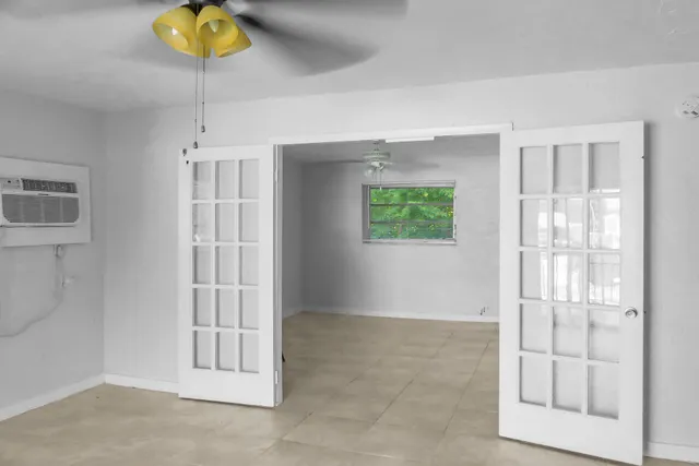 an empty room with windows