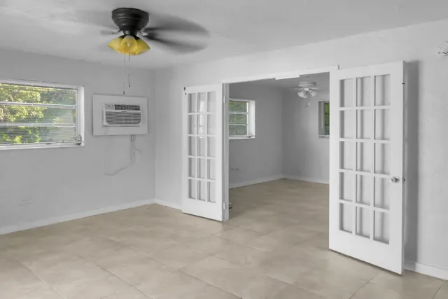 a view of a yard with large trees