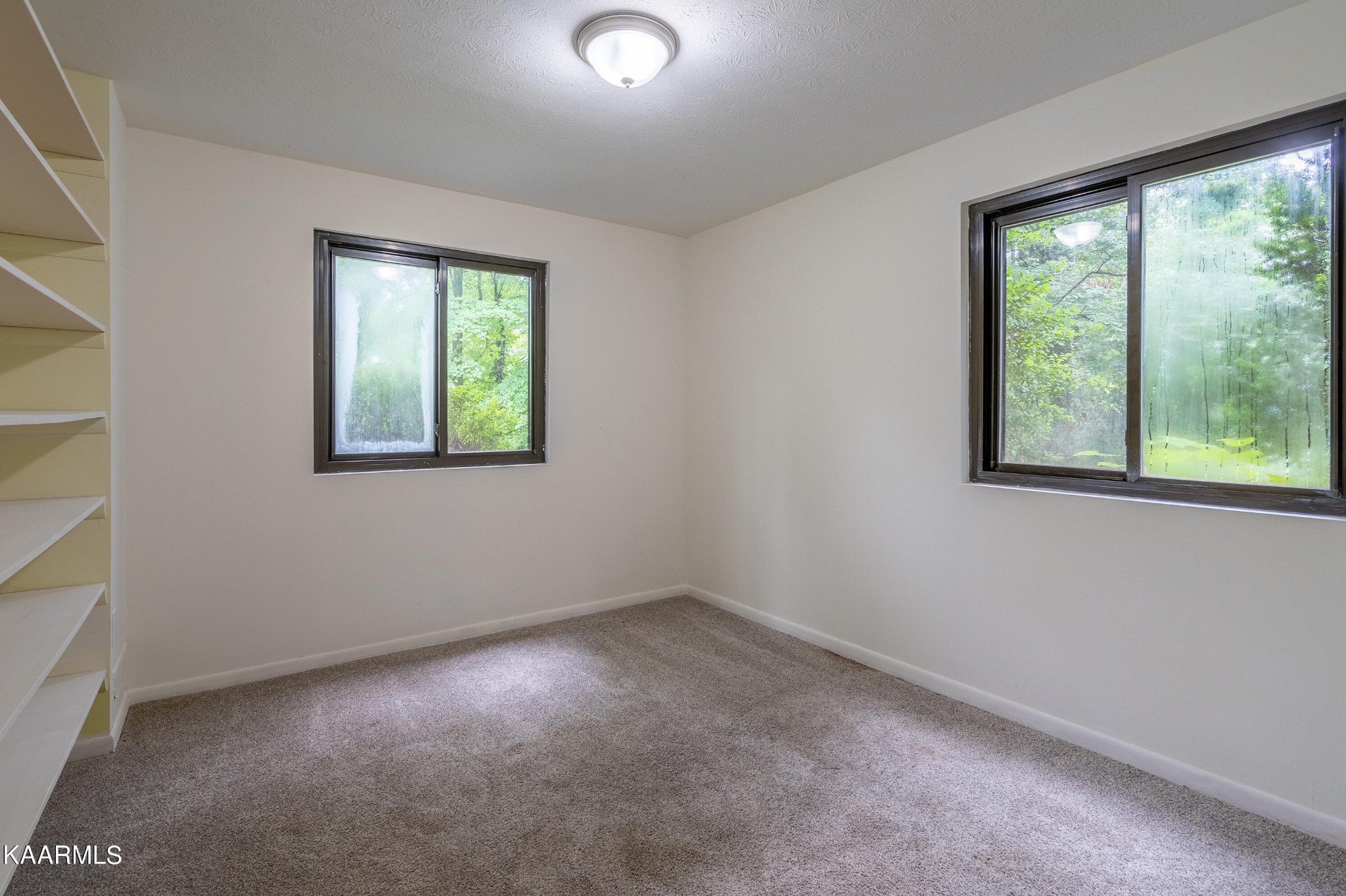 103 Canterbury Road Oak Ridge, TN 37830 - Photo 19 of 27 an empty room with windows