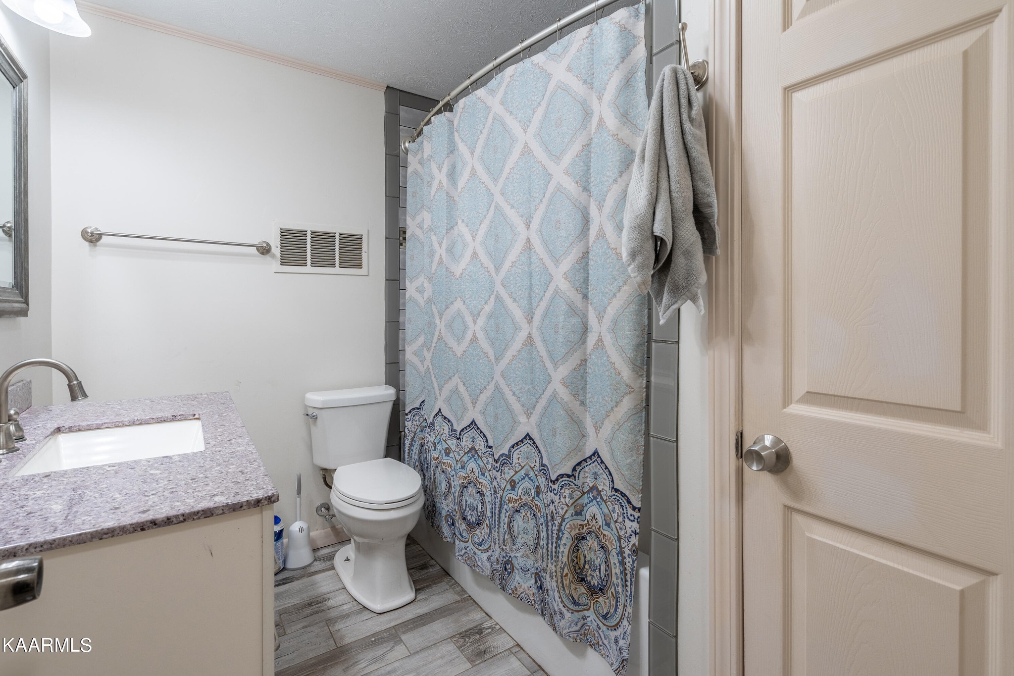 103 Canterbury Road Oak Ridge, TN 37830 - Photo 20 of 27 a bathroom with a granite countertop sink toilet and shower
