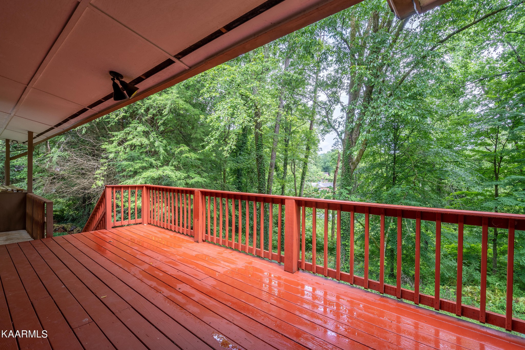 103 Canterbury Road Oak Ridge, TN 37830 - Photo 25 of 27 a balcony with view of trees in the background