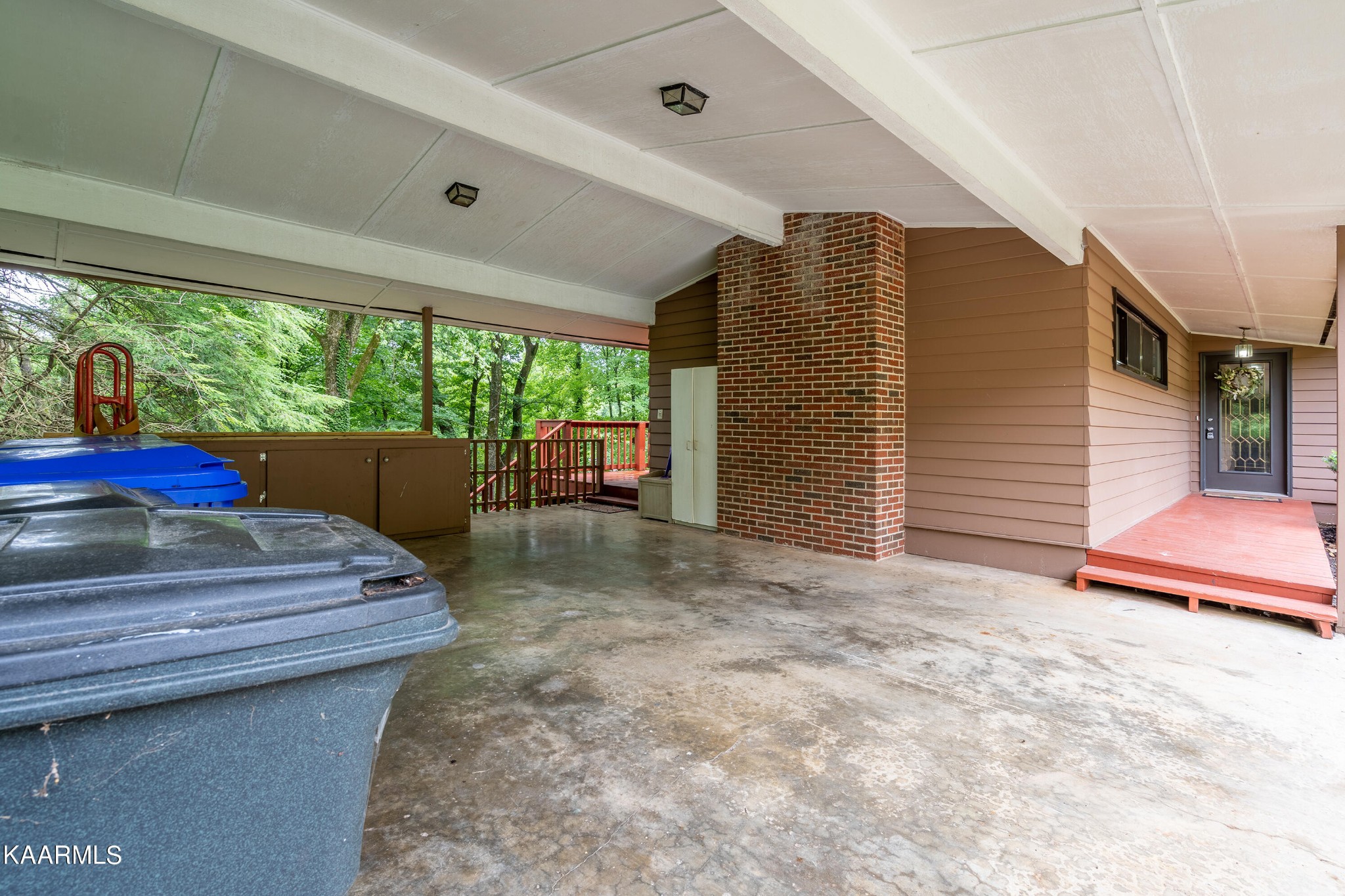 103 Canterbury Road Oak Ridge, TN 37830 - Photo 27 of 27 a bedroom with furniture and a large window