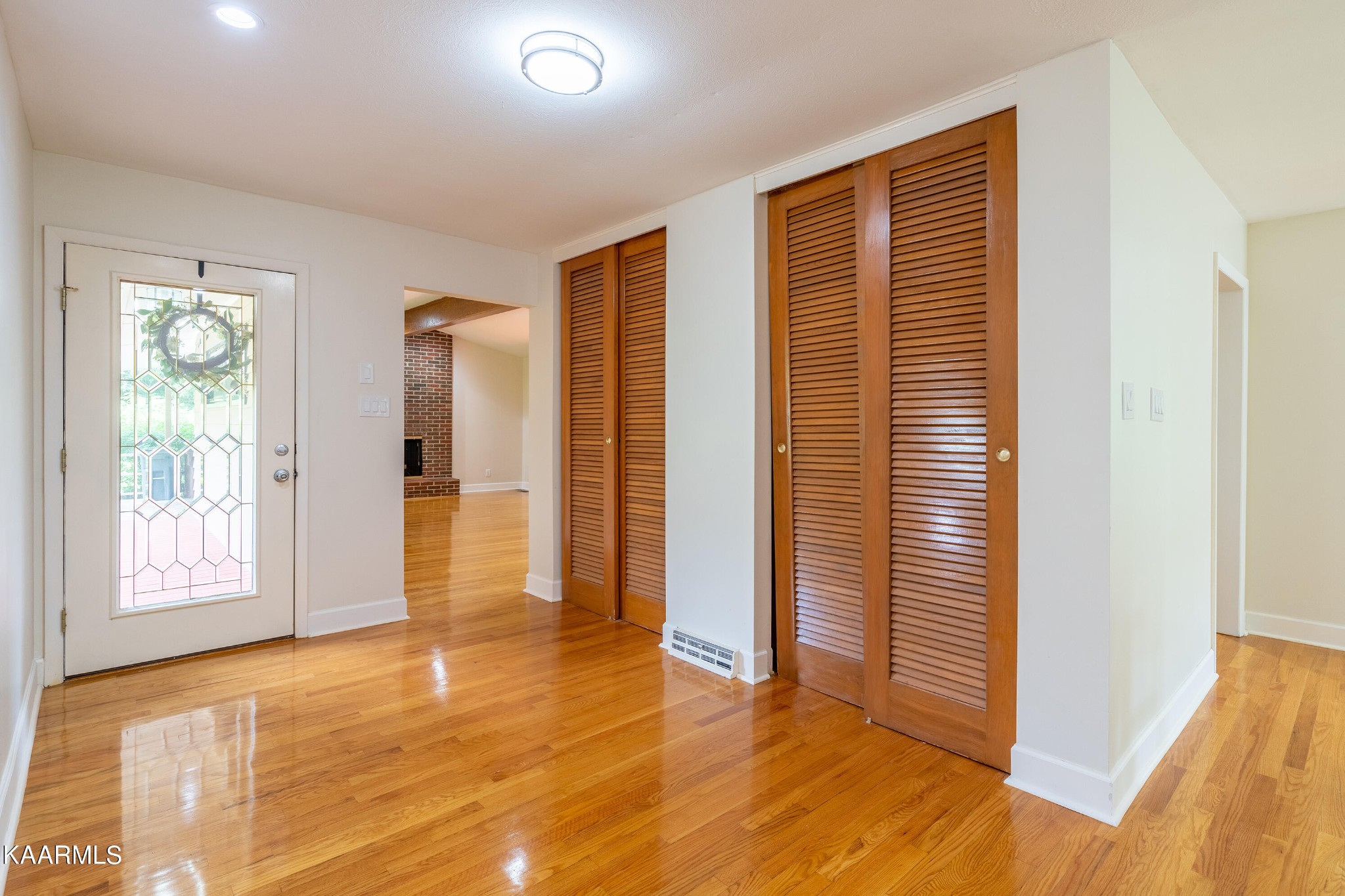 103 Canterbury Road Oak Ridge, TN 37830 - Photo 7 of 27 a view of livingroom with hardwood floor and window