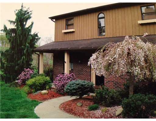 223 Sygan Road McDonald, PA 15057 - Photo 2 of 18 Exterior Front. Springtime brings an array of beautiful colors to this lovely home.