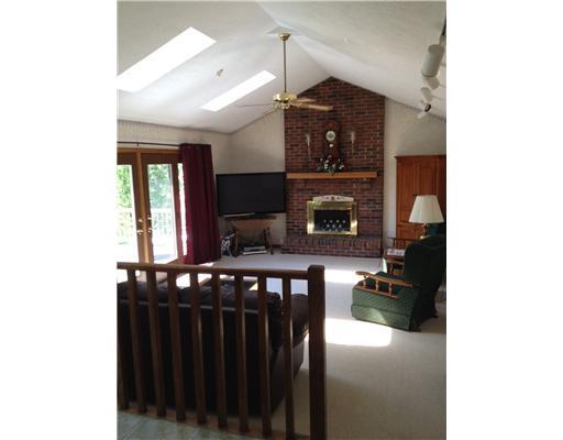 223 Sygan Road McDonald, PA 15057 - Photo 7 of 18 Family Room. This spacious open family room features a beautiful brick fireplace and french doors leading out to an inviting deck.