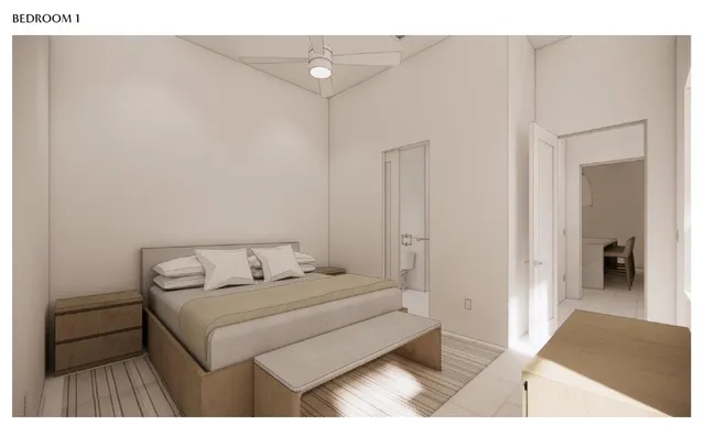 a bedroom with a bed and a walk in closet