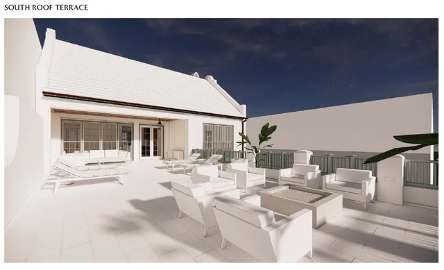 a black and white photo of a living room