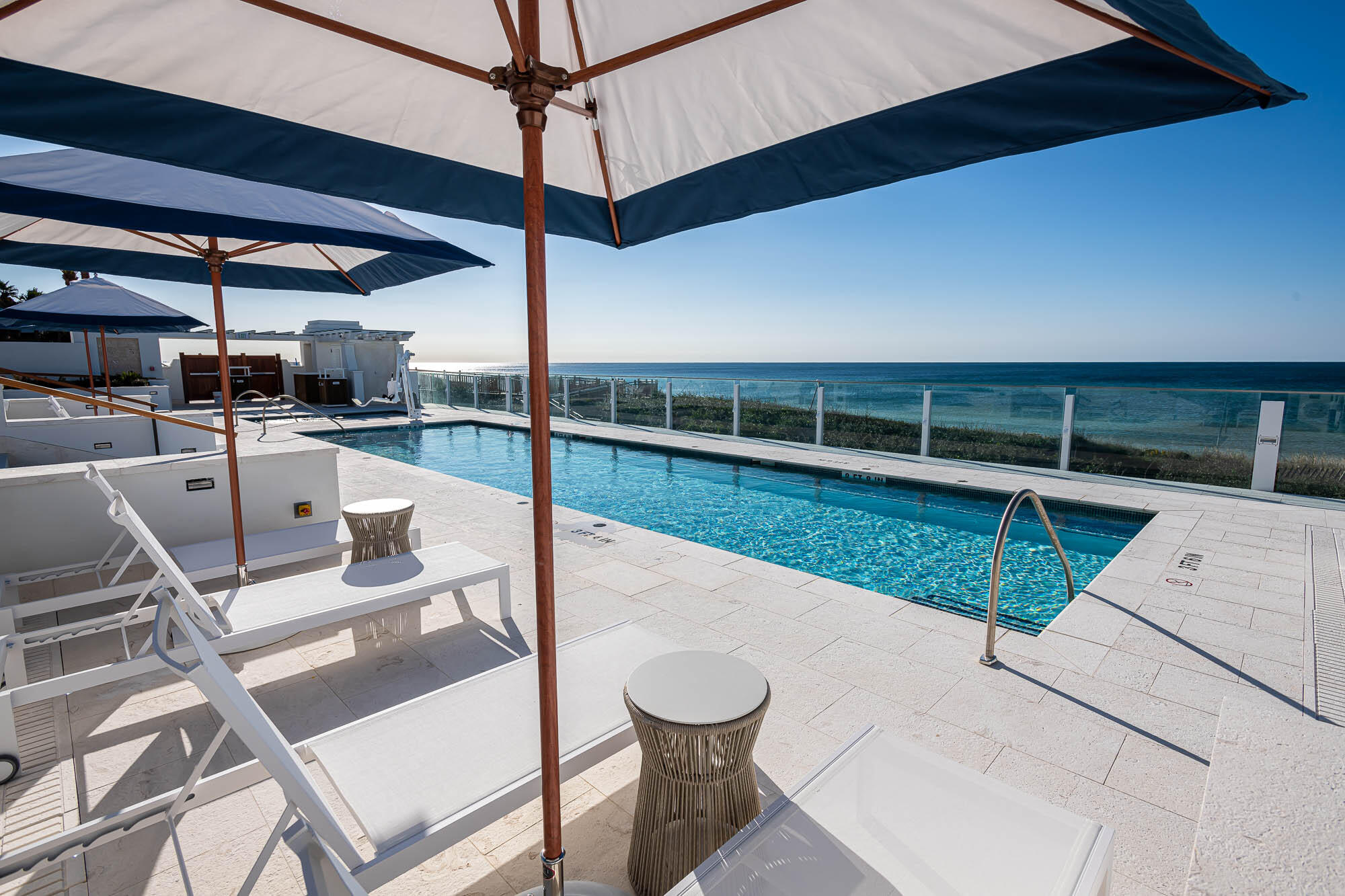 71 Elbow Beach Rd Inlet Beach Inlet Beach, FL 32461 - Photo 42 of 48 a view of a swimming pool with a chairs