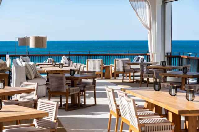 a view of a swimming pool with a chairs