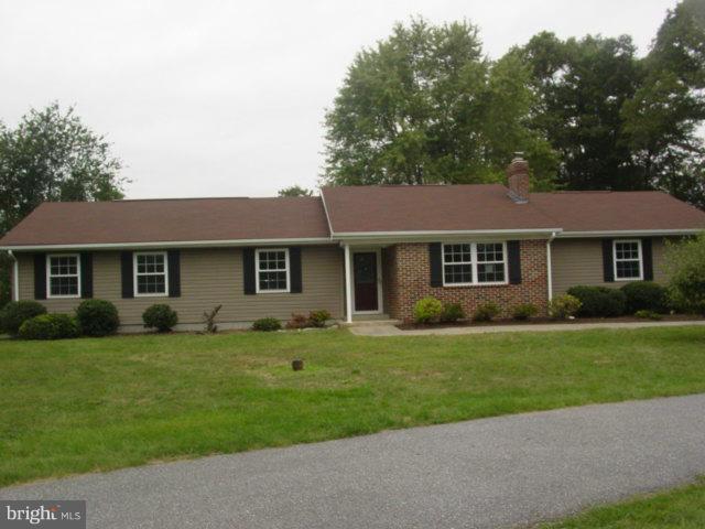 17914 Marshall Mill Road Hampstead, MD 21074 - Photo 1 of 17 a front view of a house with a garden