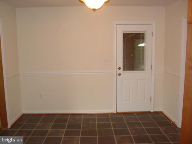 17914 Marshall Mill Road Hampstead, MD 21074 - Photo 5 of 17 a view of a utility room and empty room
