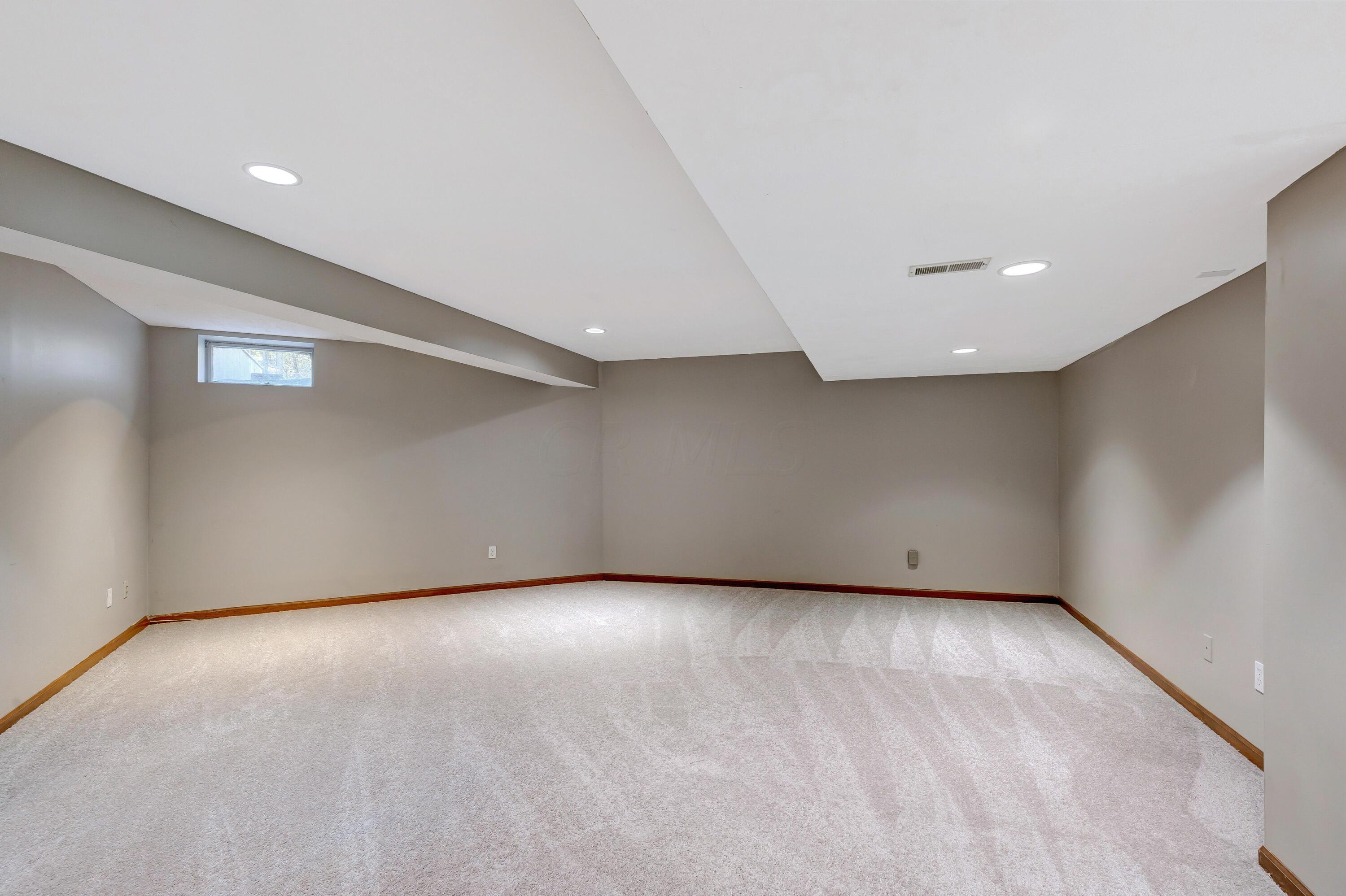 10640 Center Village Road Galena, OH 43021 - Photo 47 of 80 • New grey carpet ~ 2022 • Light grey painted walls • Can lighting • Walk-in closet with single door • Bench seat with storage