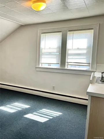 a view of swimming pool with outdoor seating and yard