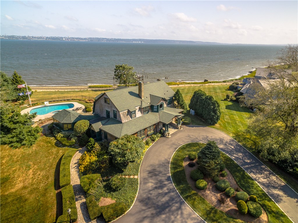 4 Stonegate Road Warren, RI 02885 - Photo 1 of 36 Spectacular waterfront estate in Touisset. Custom designed Nantucket shingle-style home with dock & salt water pool