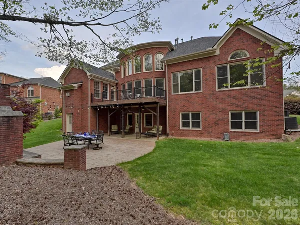 a front view of a house with patio