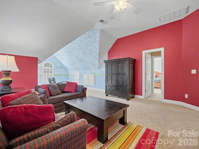 a view of a chairs on wooden deck