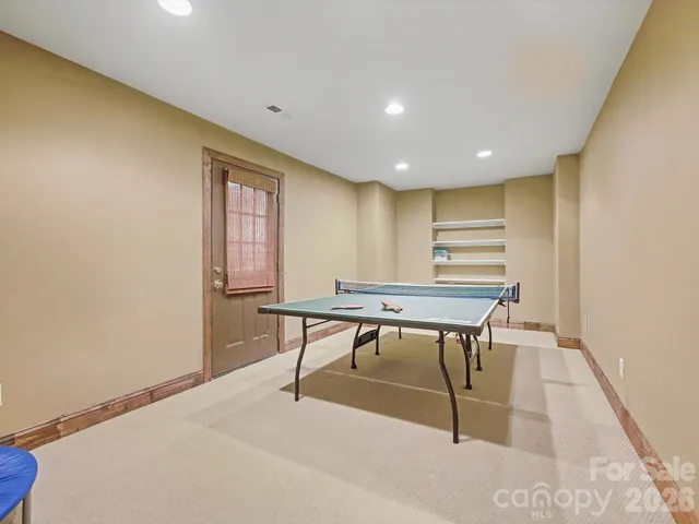 a view of a lounge chairs in the patio