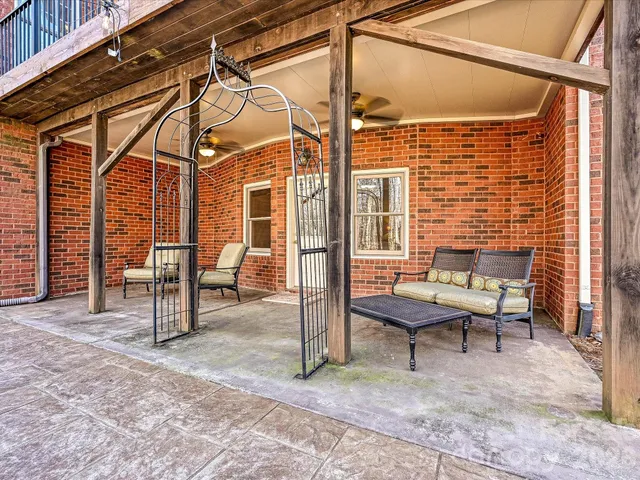 a view of a table and chairs in the patio