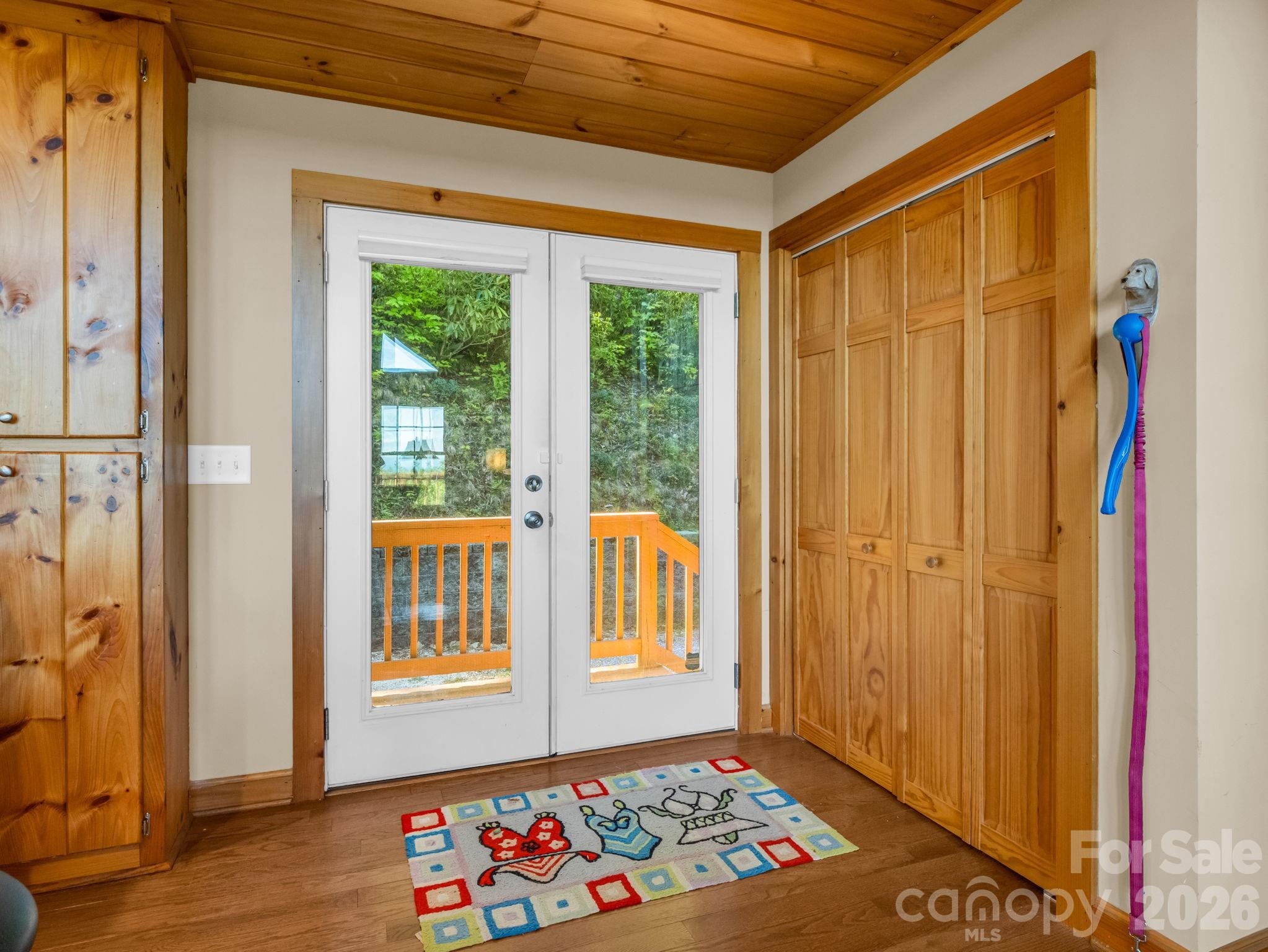 603 Pace Mountain Road Saluda, NC 28773 - Photo 7 of 44 a view of an entryway with wooden floor and door