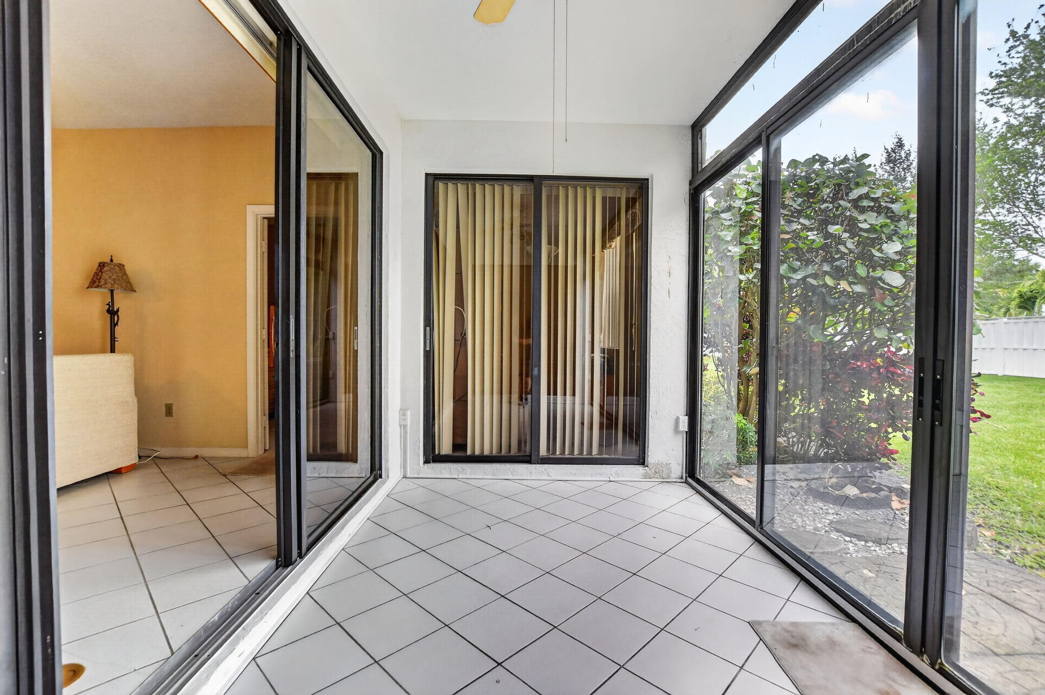 6683 Montego Bay Boulevard, Unit C Boca Raton, FL 33433 - Photo 15 of 37 a view of a bathroom with a glass door