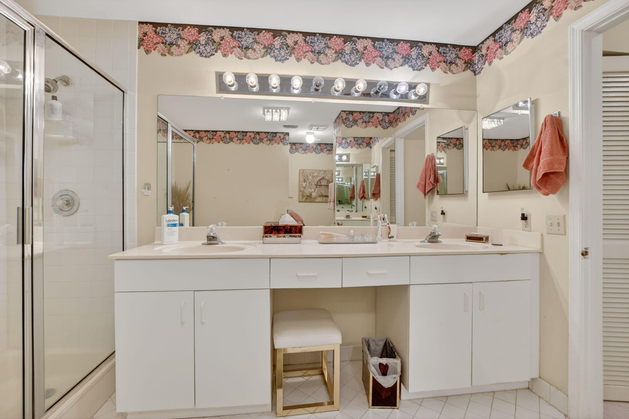 6683 Montego Bay Boulevard, Unit C Boca Raton, FL 33433 - Photo 25 of 37 a bathroom with a sink and a mirror