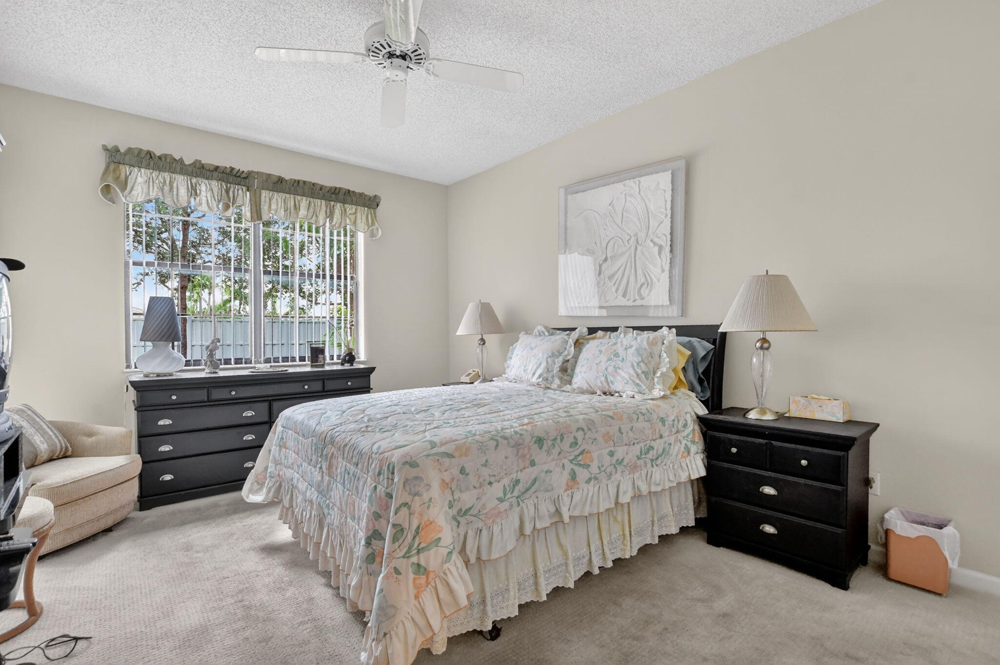 6683 Montego Bay Boulevard, Unit C Boca Raton, FL 33433 - Photo 26 of 37 a bedroom with a bed and a window