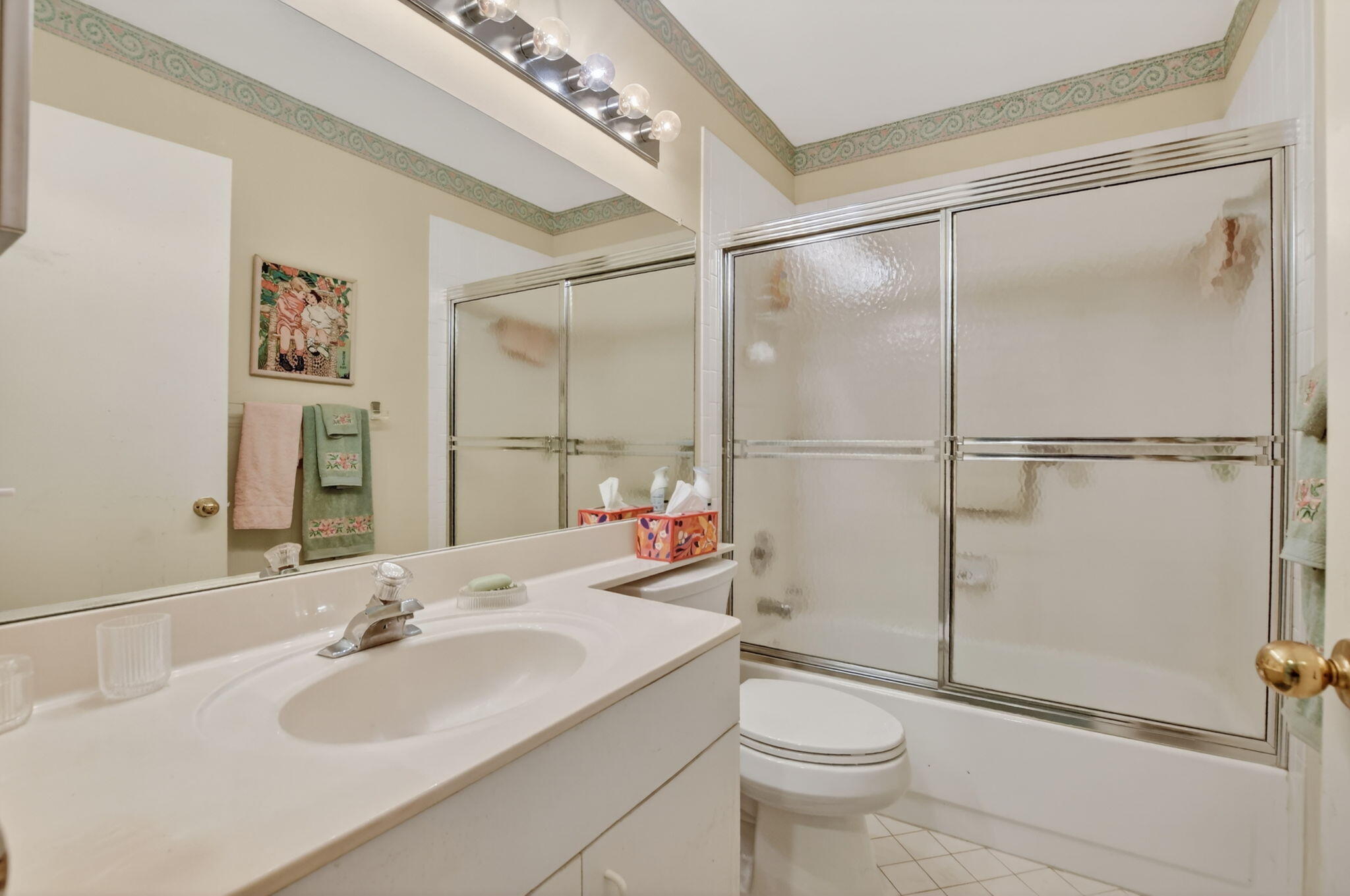 6683 Montego Bay Boulevard, Unit C Boca Raton, FL 33433 - Photo 28 of 37 a bathroom with a sink toilet and shower