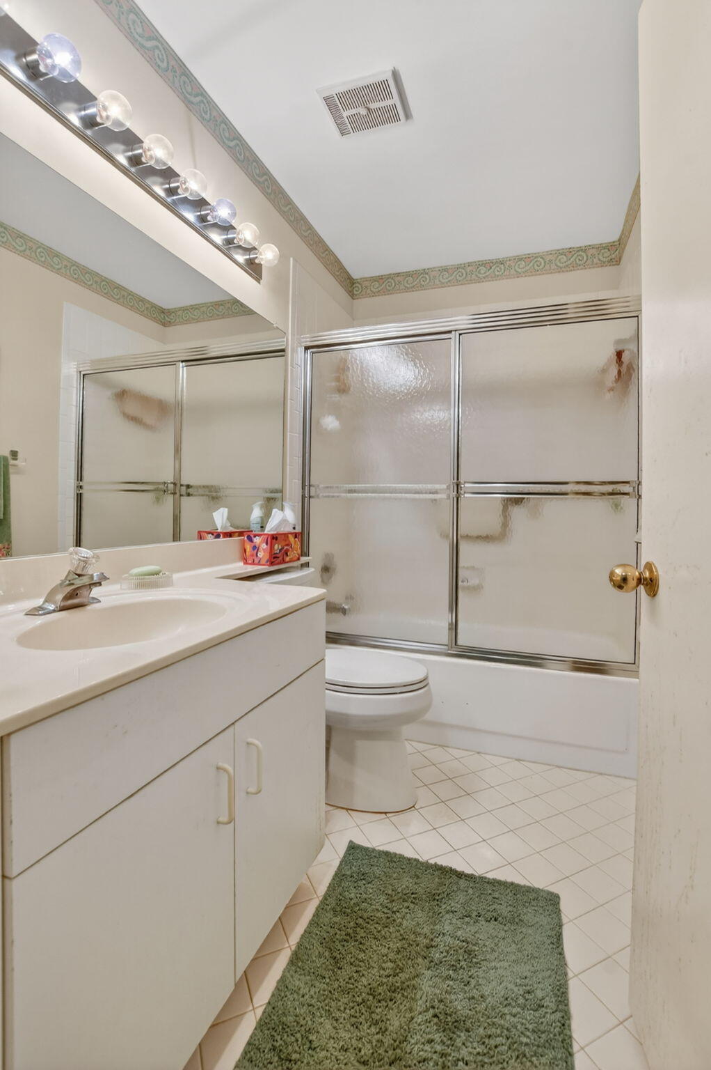 6683 Montego Bay Boulevard, Unit C Boca Raton, FL 33433 - Photo 29 of 37 a bathroom with a sink toilet and shower