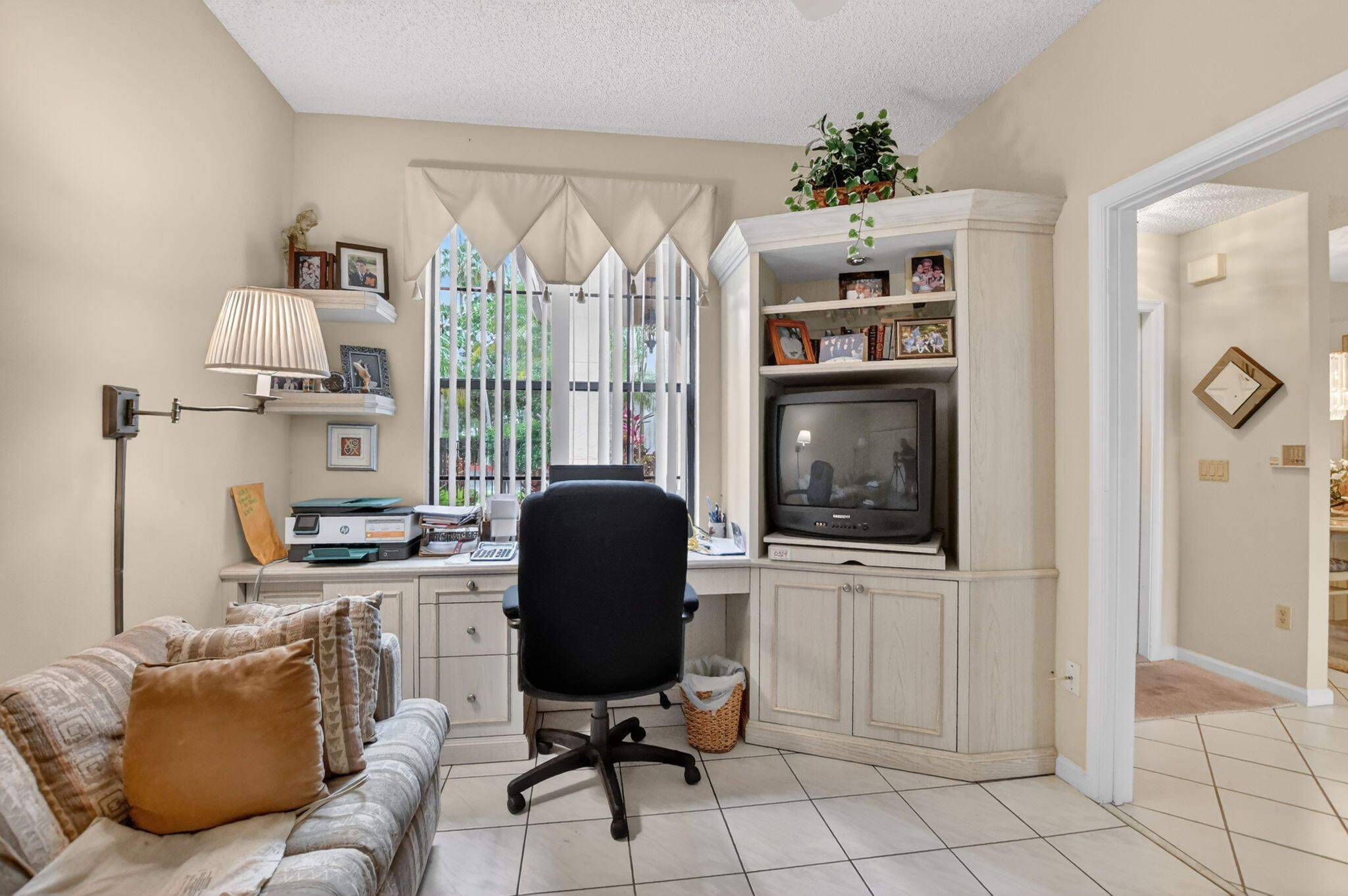 6683 Montego Bay Boulevard, Unit C Boca Raton, FL 33433 - Photo 31 of 37 a view of a livingroom with workspace and a window