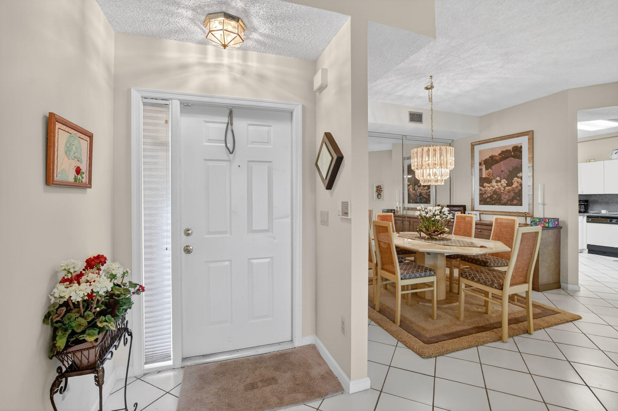 6683 Montego Bay Boulevard, Unit C Boca Raton, FL 33433 - Photo 5 of 37 a dining room with furniture and window