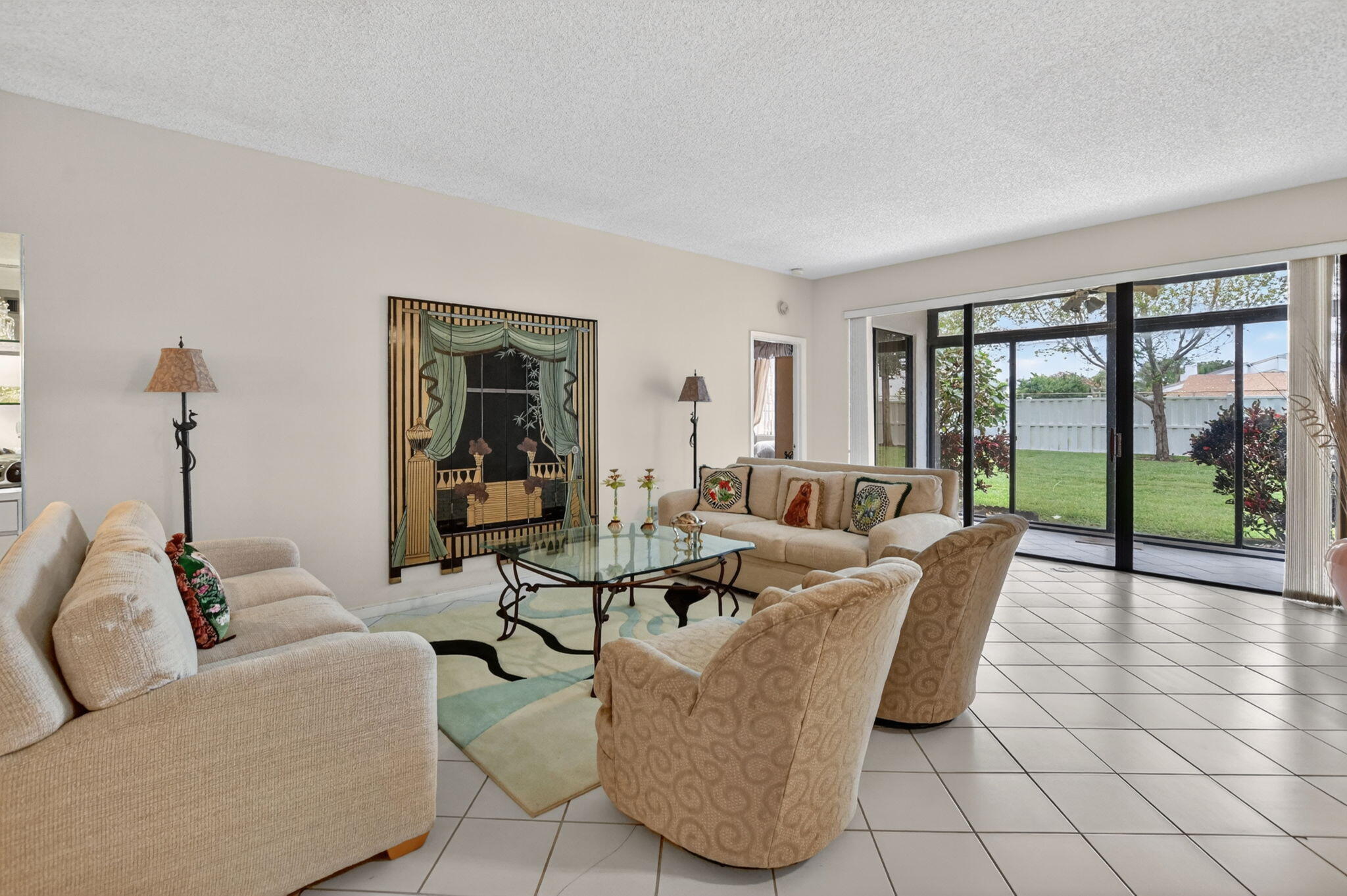 6683 Montego Bay Boulevard, Unit C Boca Raton, FL 33433 - Photo 8 of 37 a living room with fireplace furniture and a large window
