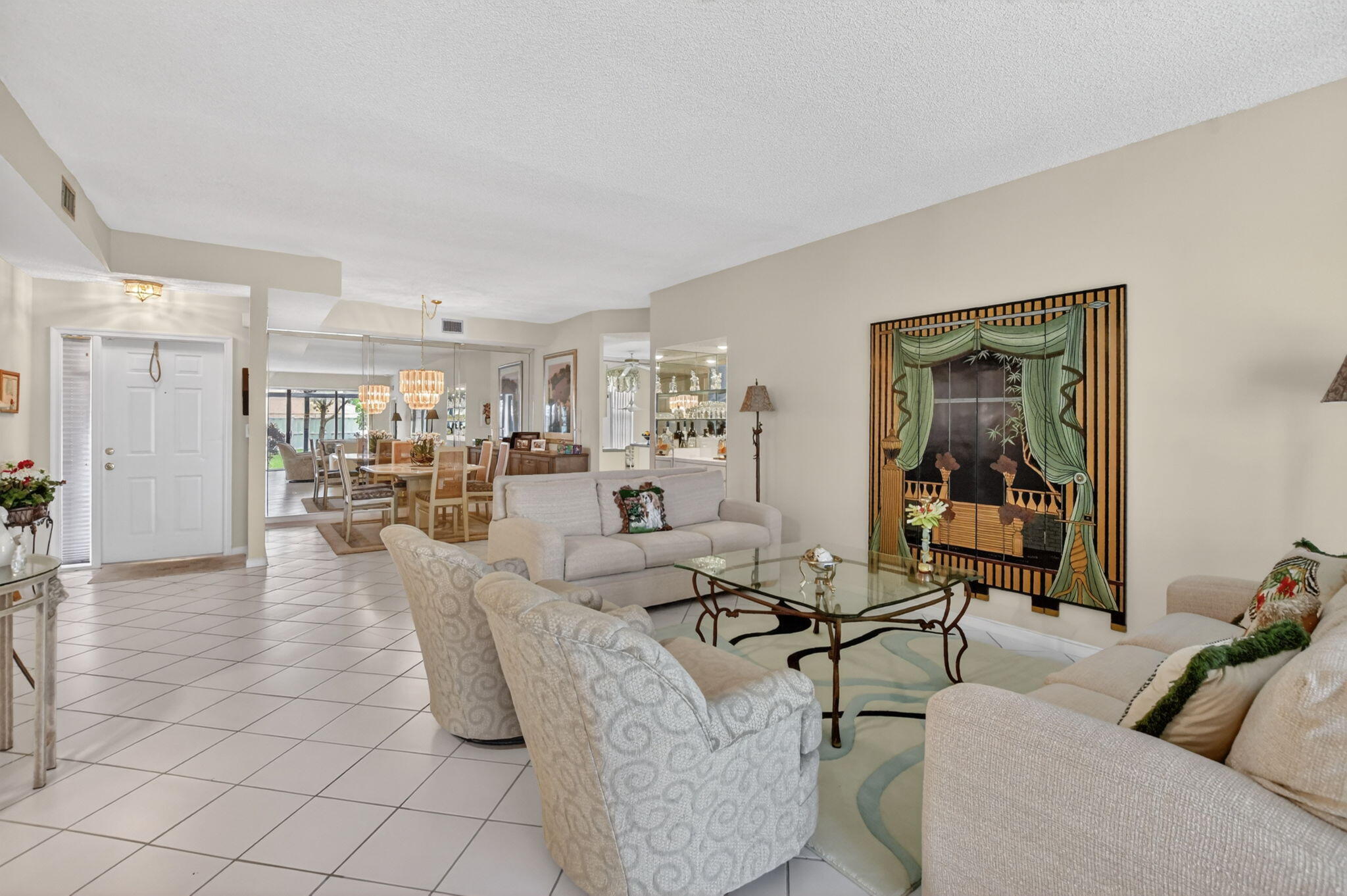 6683 Montego Bay Boulevard, Unit C Boca Raton, FL 33433 - Photo 9 of 37 a living room with furniture and a table