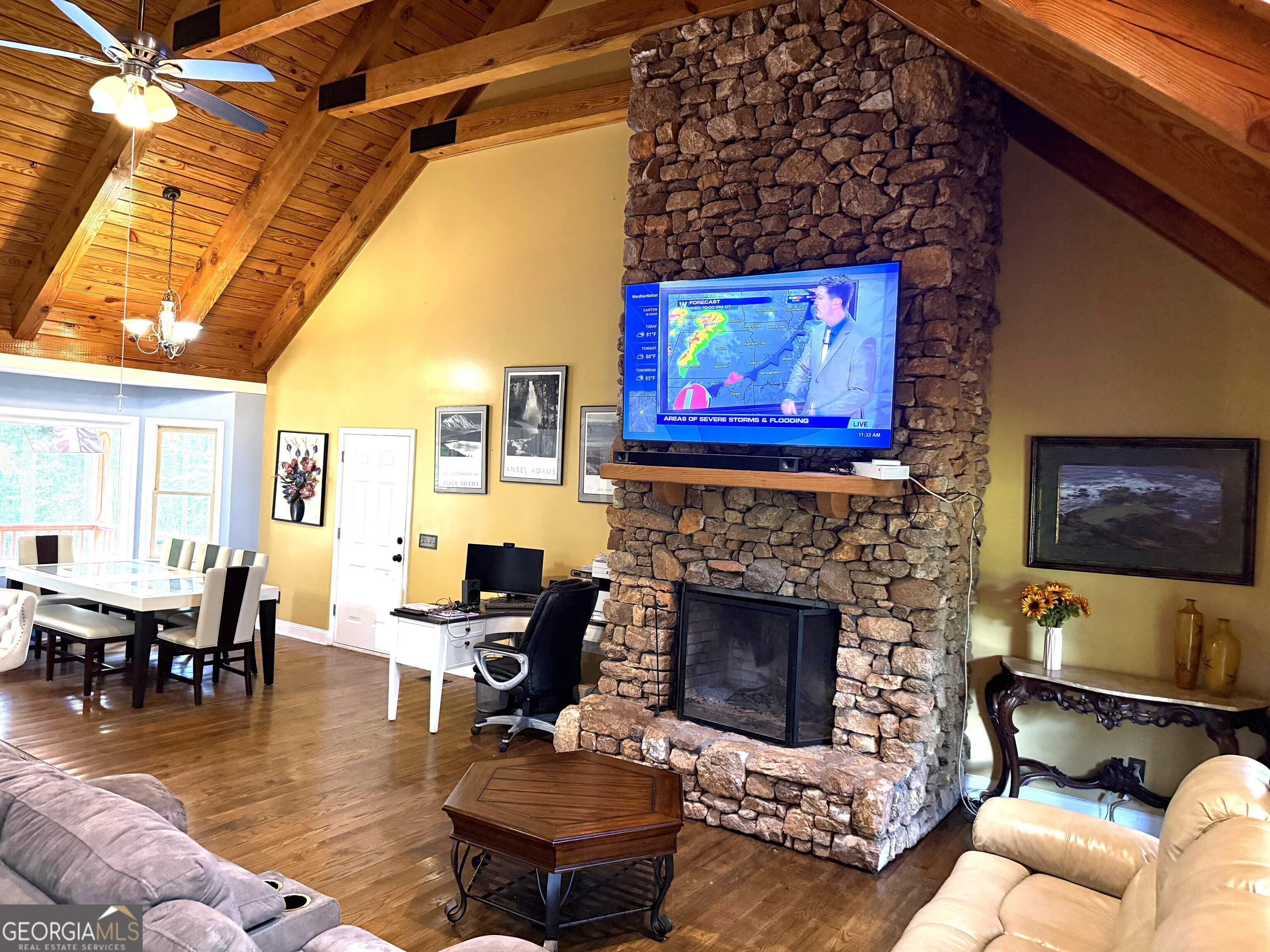 725 Musgrove Road Griffin, GA 30223 - Photo 6 of 52 a living room with furniture and a fireplace
