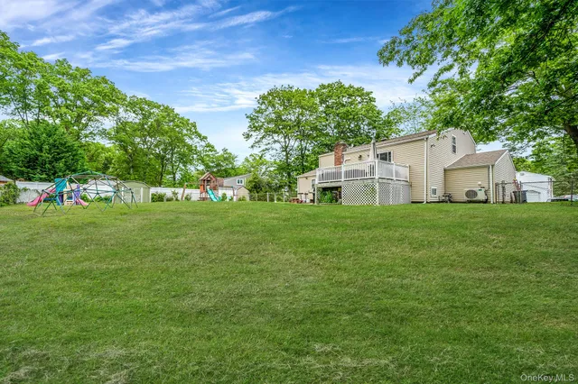 a view of a house with a big yard