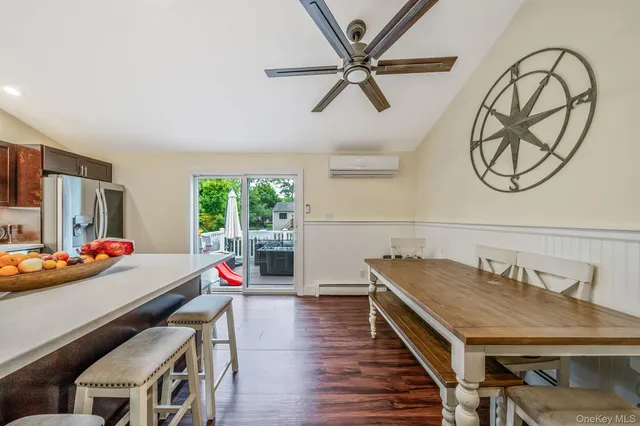 a room with furniture and a wooden floor