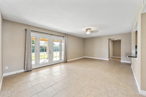 a view of an empty room with a window