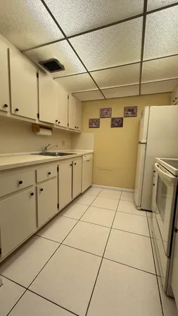 a view of a bathroom with a glass door