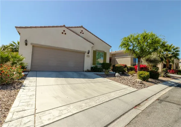 a view of house with outdoor space and a street view