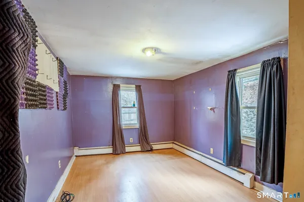 an empty room with windows