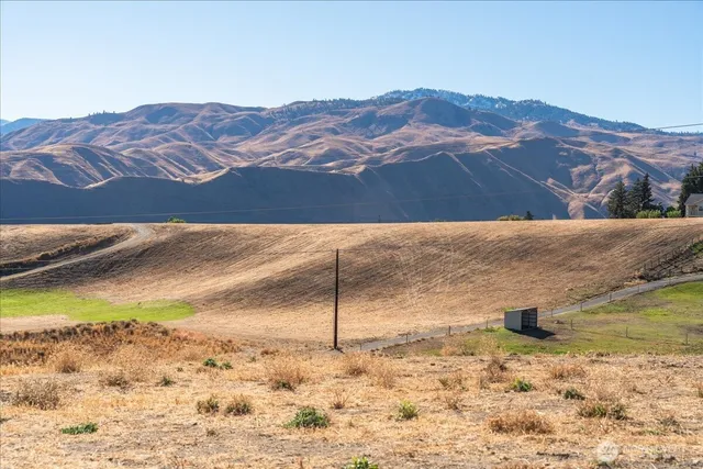 a view of a house with a mountain