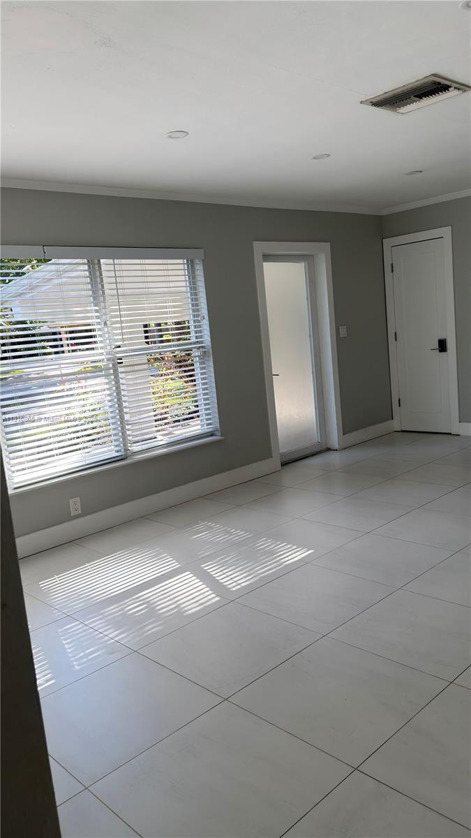 1577 Northeast 48th Court Oakland Park, FL 33334 - Photo 11 of 21 a view of room with window