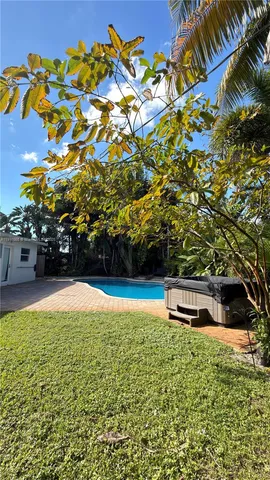 a view of outdoor space yard and swimming pool